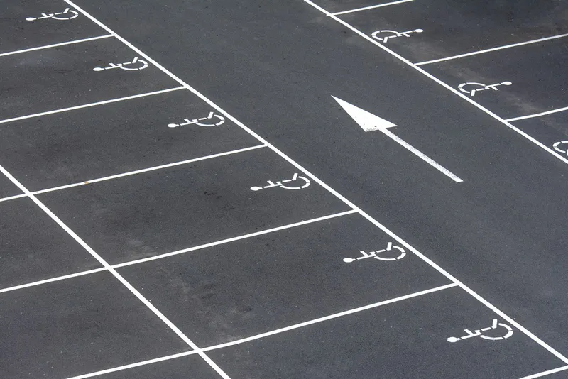 Supporting photo of a clean asphalt parking lot